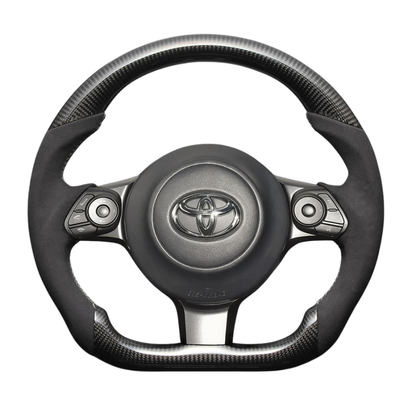 最上位モデル (艶有リアルカーボン×アルカンターラBK×シルバーステッチ) 純正交換ガングリップステアリング 86/GR86 ZN6/ZN8 H28/-R6/4 LS242